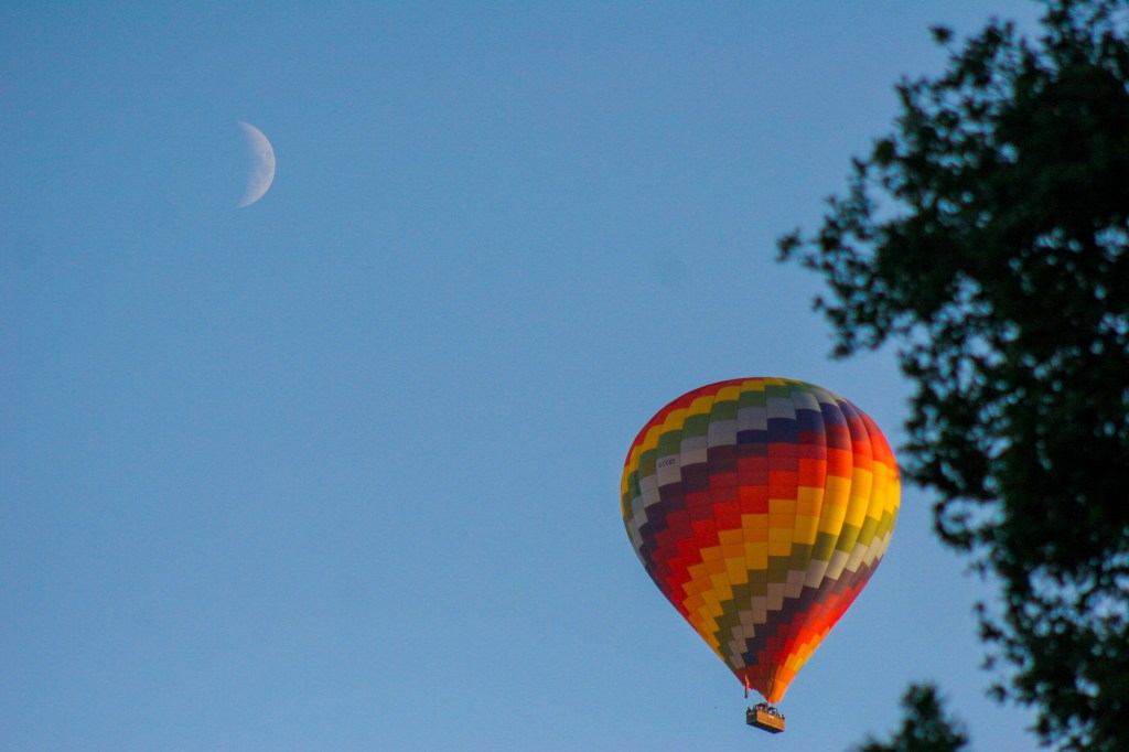 The moon and a balloon. Surrey, England